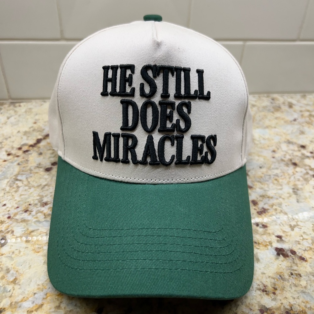 He Still Does Miracles Trucker Cap